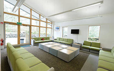 lounge-includes-couches-tables-and-tv